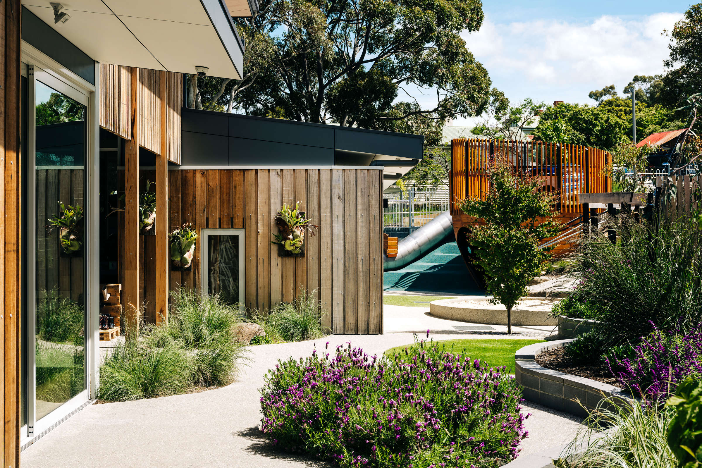 St Cuthbert’s Early Years – Catholic Education Tasmania:  Landscaping and building are integral to each other, together forming rich and varied play space for active and passive play and learning. Photo by Adam Gibson. Photo by Adam Gibson.